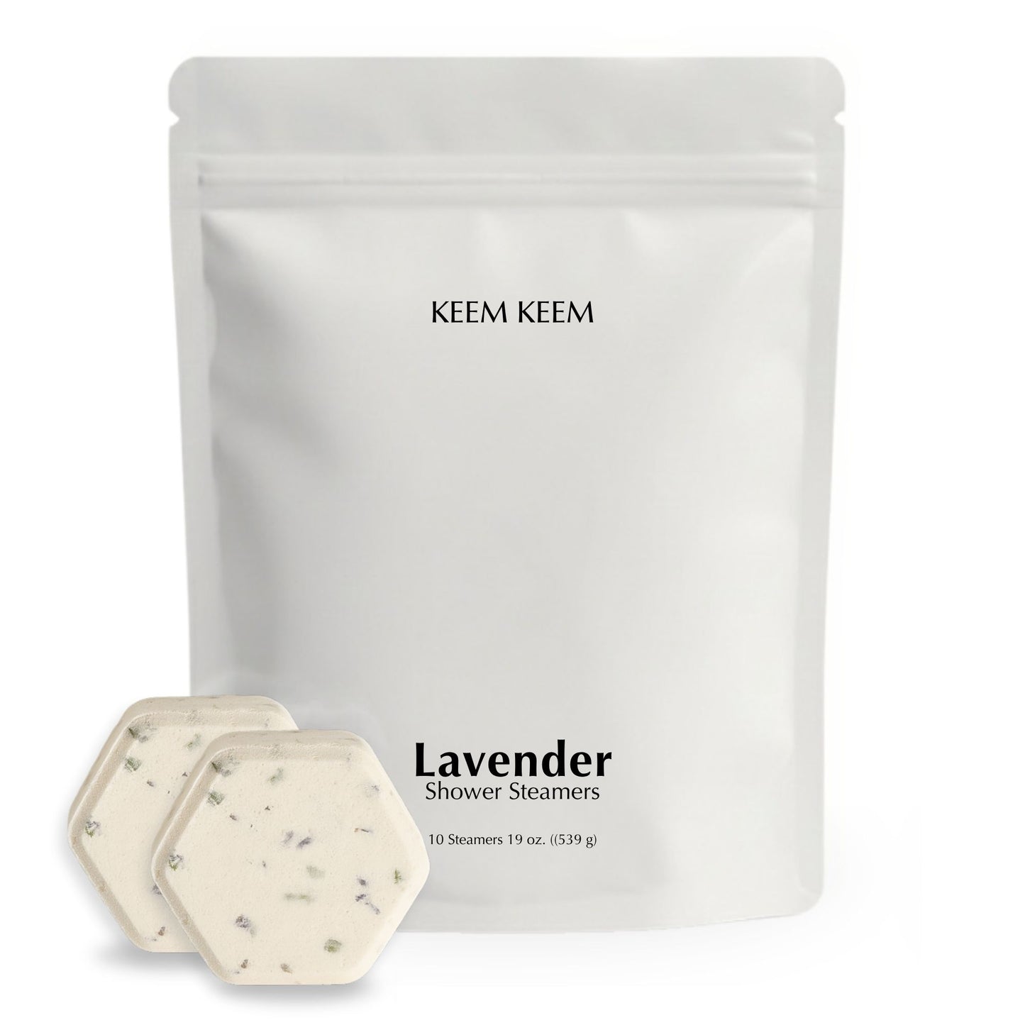 Minimalist stand-up pouch of Keem Keem Lavender Shower Steamers with two hexagon tablets displayed in front, showing lavender buds and premium packaging design.