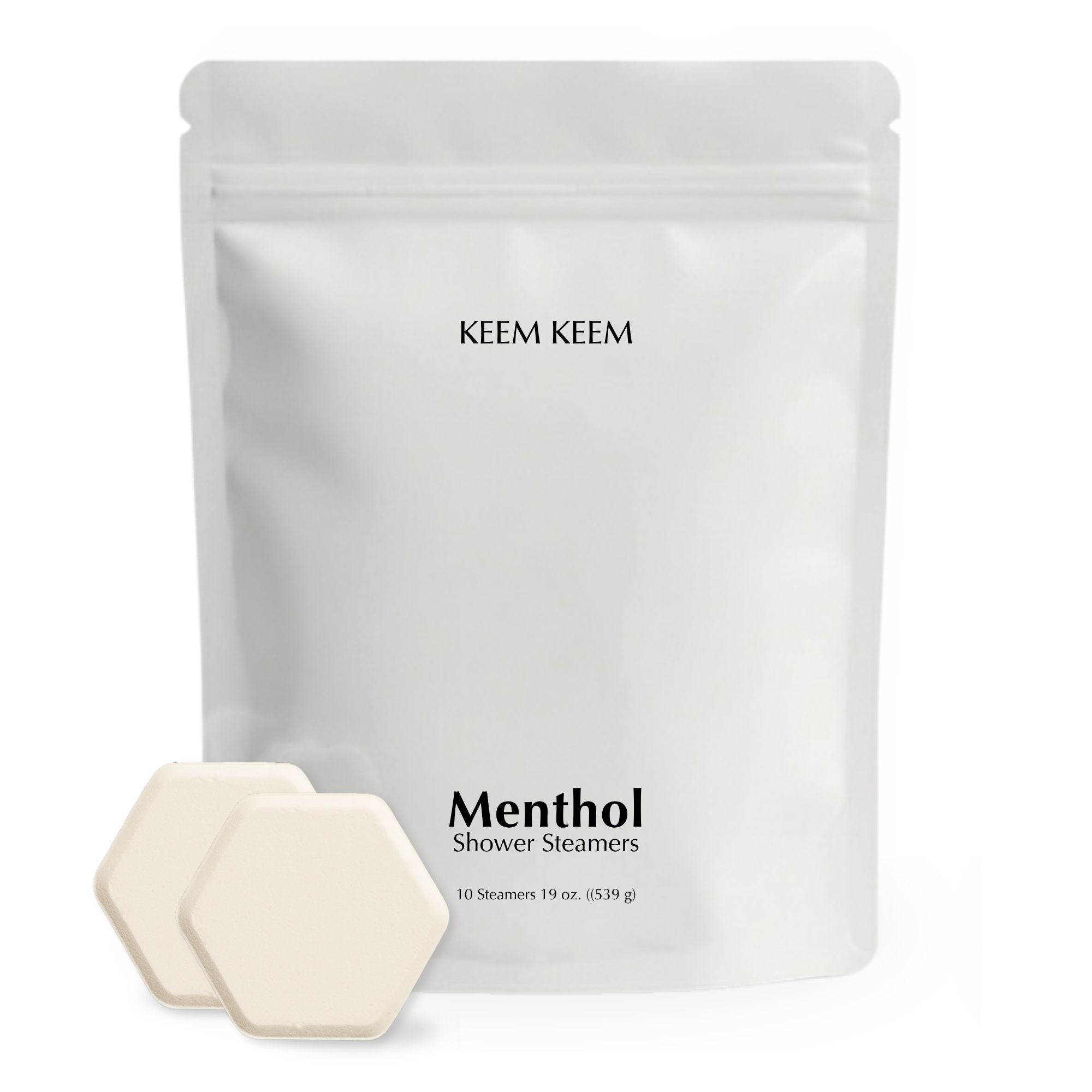 Minimalist stand-up pouch of Keem Keem Menthol Shower Steamers with two hexagon tablets displayed in front, showcasing clean packaging and product size.